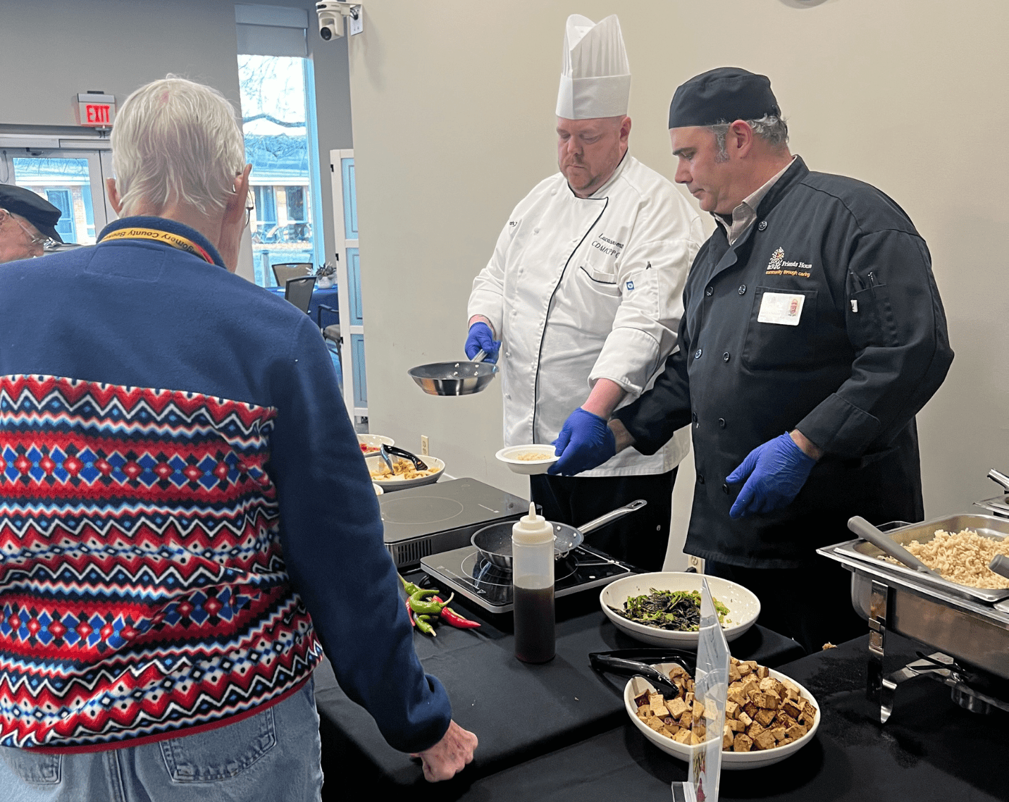 Aramark SeniorLIFE+ Corporate Executive Chef Lucas Leventry at a Korean Bowl pop-up culinary demonstration.